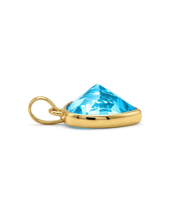 Herzförmiger Anhänger aus 18k Gelbgold mit blauer Zirkonia in flacher Seitenansicht.