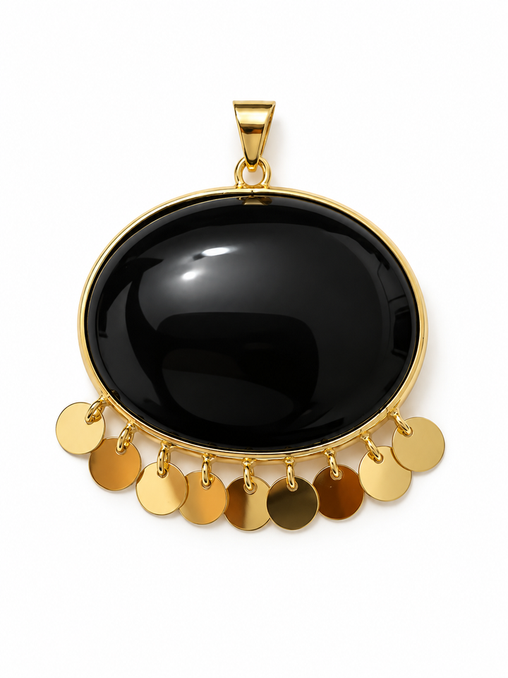 Detailaufnahme des schwarzen Shab-e Tala Anhängers mit beweglichen Goldplättchen aus 18k Gelbgold