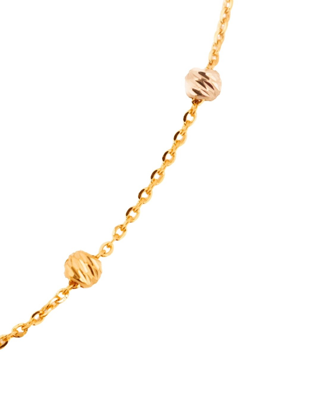 Nahaufnahme: Grossaufnahme der wunderbar verarbeiteten Kugeln in Weiss- und Gelbgold