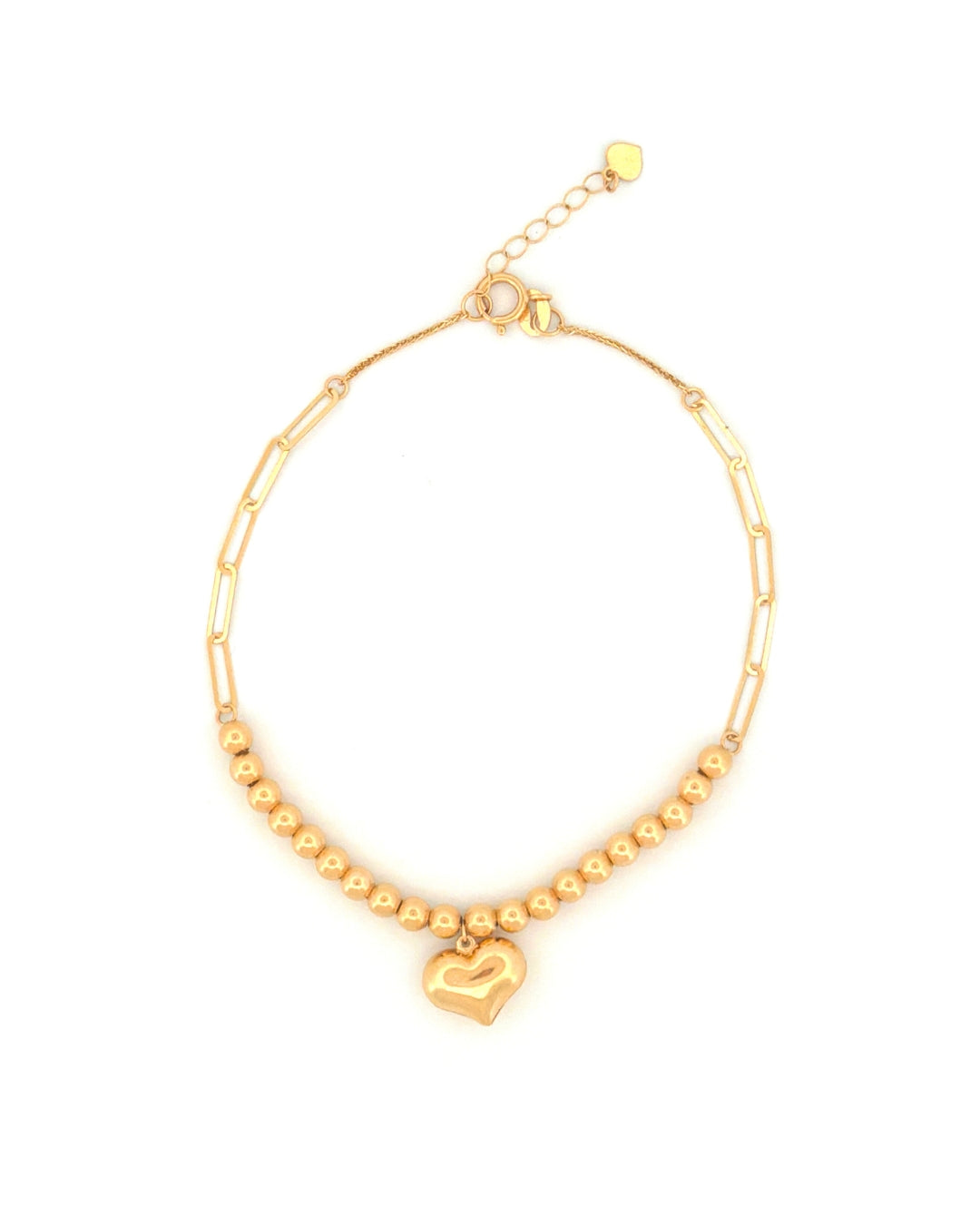 18k Gelbgold-Armband mit Herz, feiner Ankerkette, Paperclip-Elementen und Goldkugeln, freigestellt auf hellem Hintergrund.