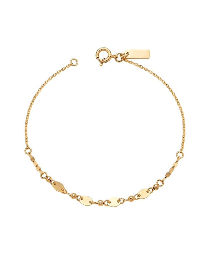 Feines Armband aus 18k Gelbgold mit ovalen Elementen und Kugeldetails, freigestelltes Produktbild