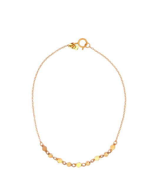 Feines Armband aus 18k Gelbgold mit Kugeln und geometrischen Zierelementen, freigestelltes Produktbild