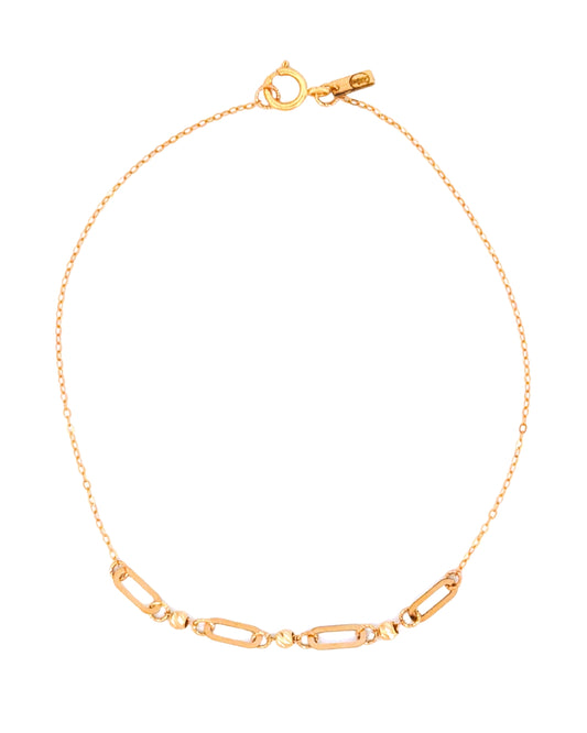 Feines Armband aus 18k Gelbgold mit abwechselnden Paperclip- und Kugel-Elementen, freigestelltes Produktbild