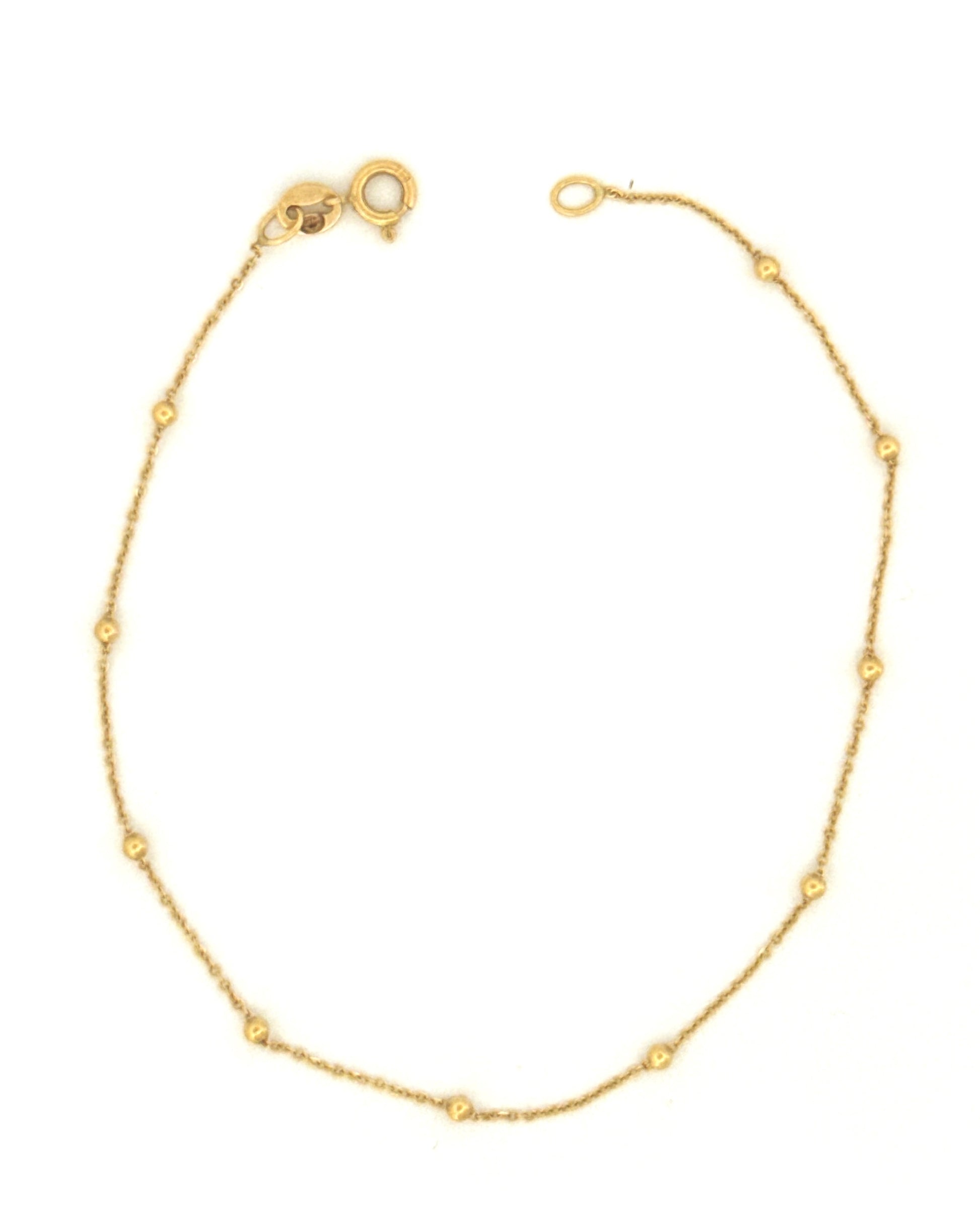 Armband aus 18k Gelbgold mit goldenen Akzenten – freigestellt.