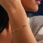 Armband Gelbgold 18k – Zanjir-e Figaro-ye Chahâr Halgheh (Figaro-Kette 4-gliedrig)