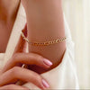 Armband Gelbgold 18k – Zanjir-e Figaro-ye Chahâr Halgheh (Figaro-Kette 4-gliedrig)