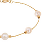 Detailaufnahme der Perlen und 2 mm Goldkugeln aus 18k Gelbgold