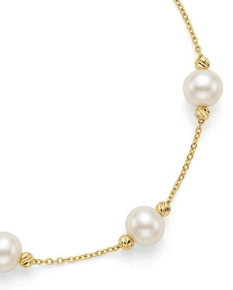 Detailaufnahme der Perlen und 2 mm Goldkugeln aus 18k Gelbgold