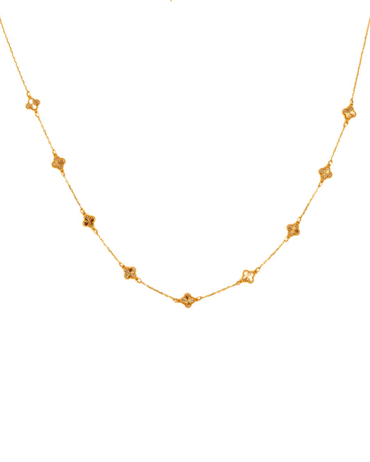 Halskette aus 18k Gelbgold mit filigranen Kleeblatt-Elementen – freigestellt