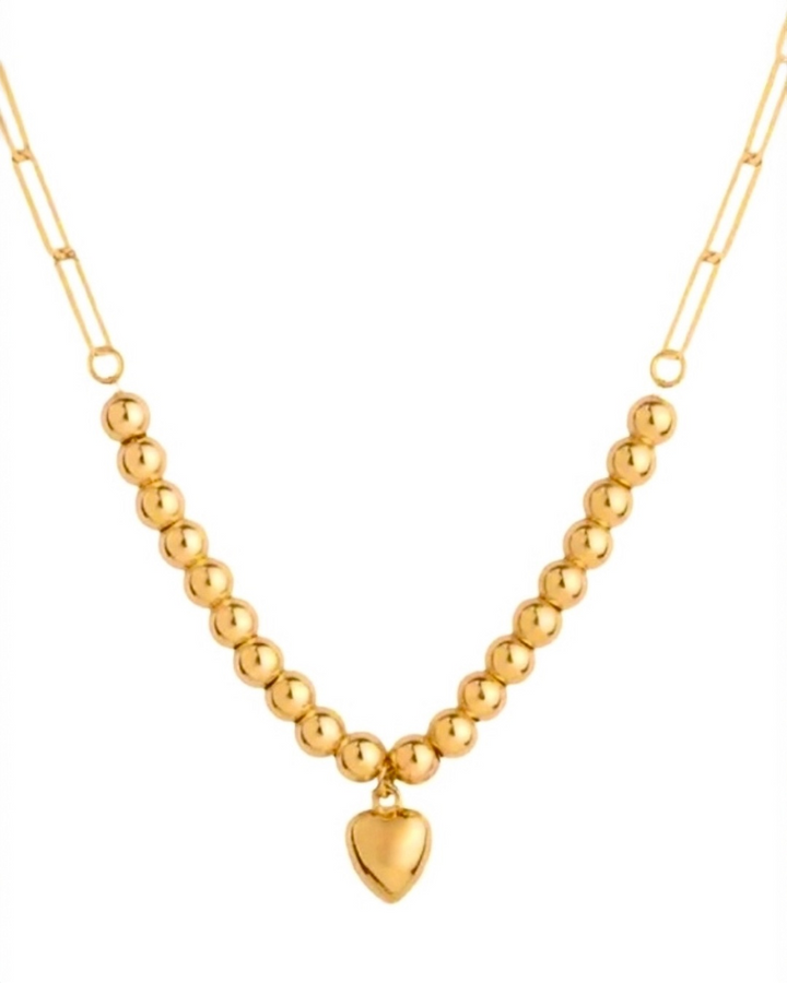Detailaufnahme der 18k Gelbgold-Halskette mit 2 mm Kugeln und 5 mm Herz
