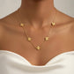 18 Karat Gelbgold-Halskette mit fünf Kleeblättern – eleganter Glücks-Schmuck aus echtem Gold, filigrane Damenhalskette mit luxuriösem Design und zeitloser Ausstrahlung.