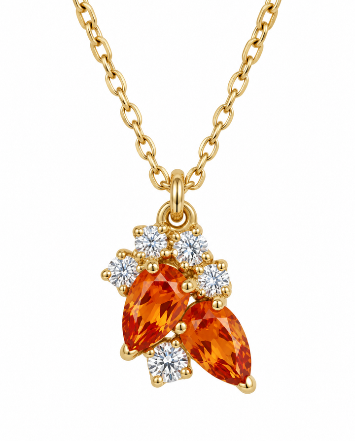 18 Karat Goldkette mit elegantem Anhänger aus orangefarbenen Edelsteinen und funkelnden Zirkonia – filigraner Damenschmuck in Gelbgold