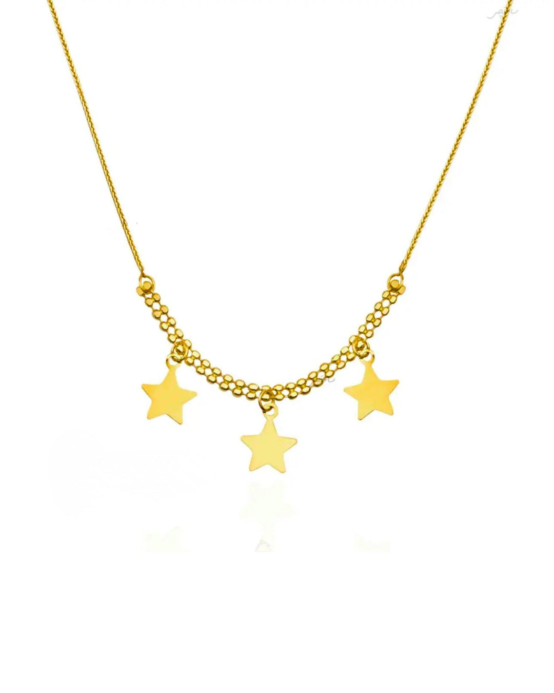 Detailaufnahme der drei goldenen Sterne an filigraner Kette