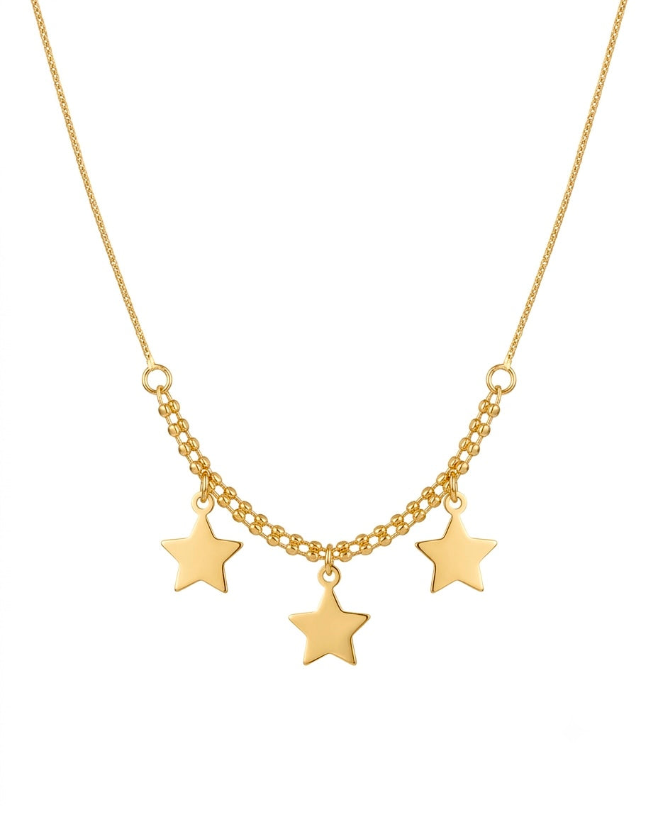 Detailaufnahme der drei goldenen Sterne an filigraner Kette