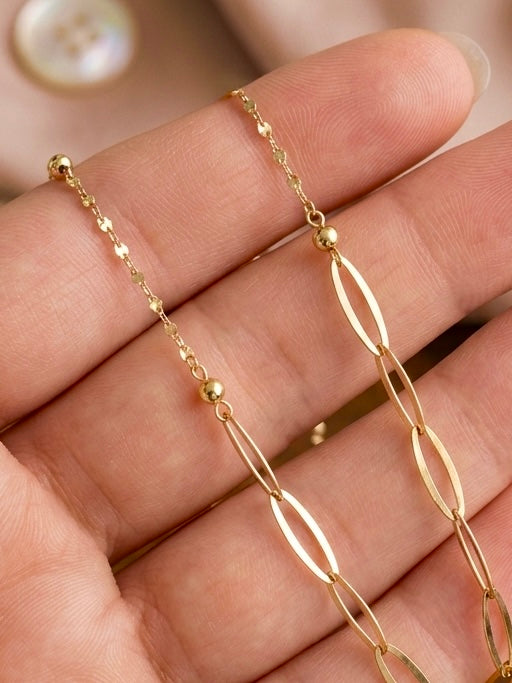 18 Karat Gold Halskette mit länglichen, satinierten Ovalelementen und feiner Ankerkette – eleganter, moderner Damenschmuck