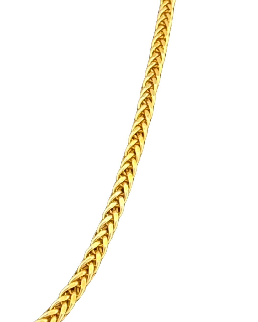 Zopfmuster-Halskette aus 18k Gelbgold mit 3 mm Zopfmuster-Gliedern auf hellem Hintergrund