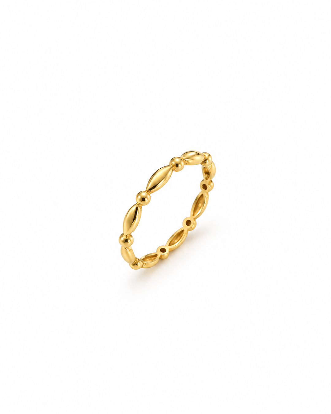 Ring Daneh aus 18 Karat Gelbgold mit länglichen, glänzenden Goldelementen und kleinen runden Goldkügelchen auf weissem Hintergrund.
