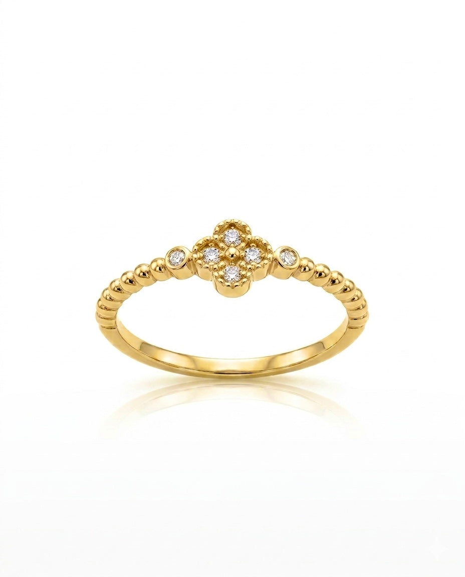 Eleganter Damenring aus 18k Gelbgold mit sechs weissen Zirkonia