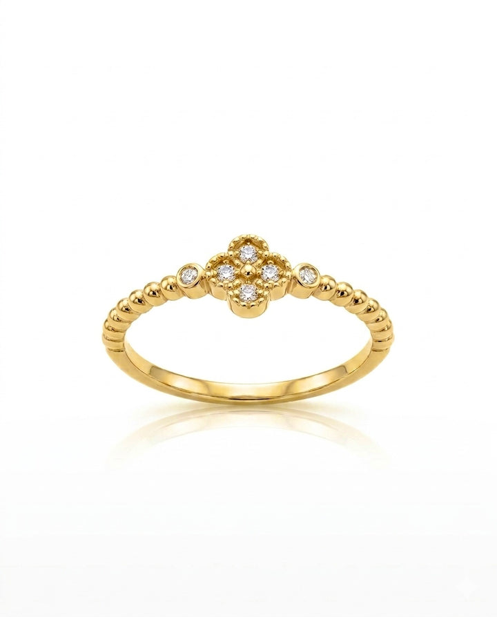 Eleganter Damenring aus 18k Gelbgold mit sechs weissen Zirkonia