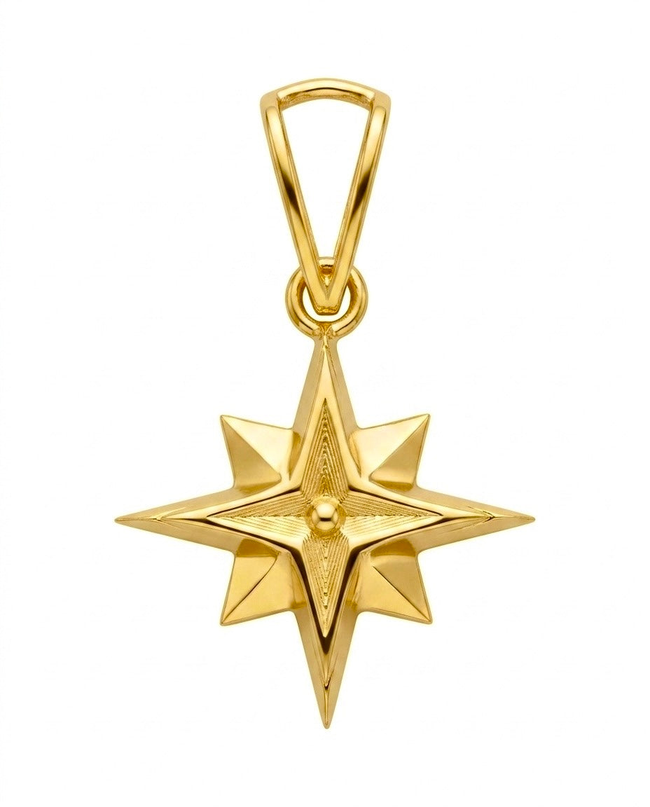 Detailaufnahme eines Polarstern Anhängers aus 18k Gelbgold mit geometrischer Sternform.