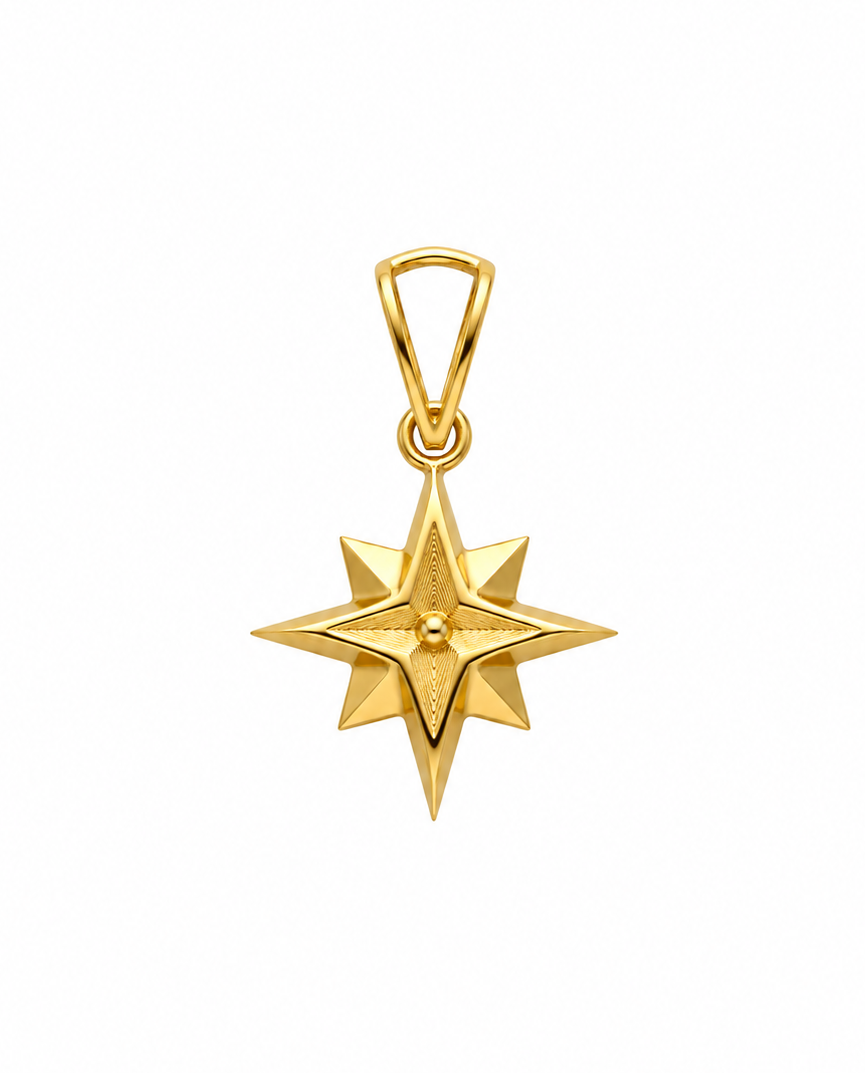 Detailaufnahme eines Polarstern Anhängers aus 18k Gelbgold mit geometrischer Sternform.